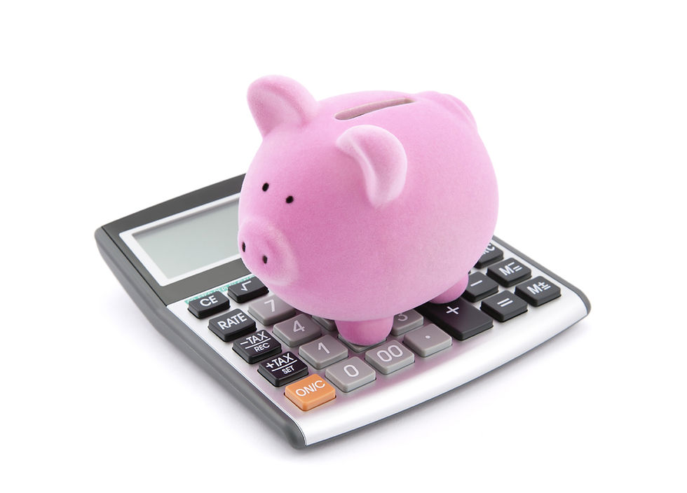 A pink piggy bank sits on a large calculator. The background is white, and the calculator has gray, black, and orange buttons.